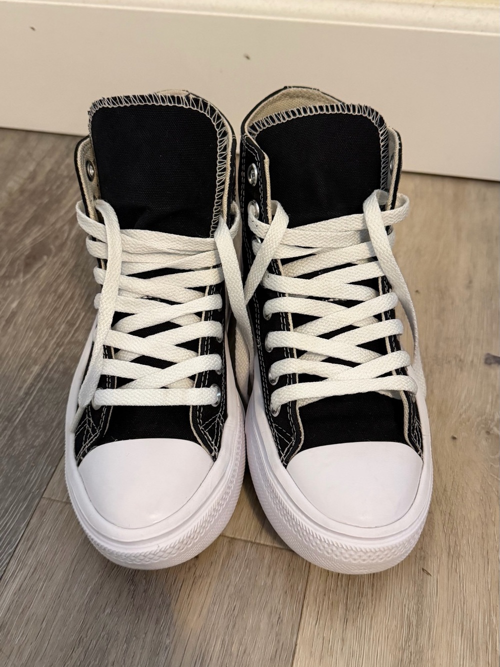 Converse Black and White High-Top Sneakers